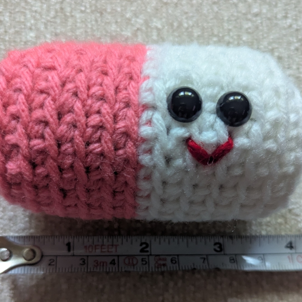 Pink and White Knitted Plush Pill